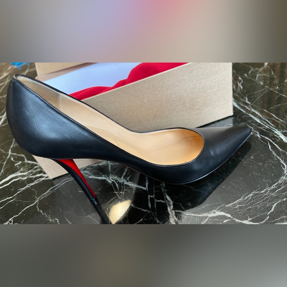 Christian Louboutin
Leather Pointed Red-Sole Pumps
Color: Black
Size: 8B / 38EU